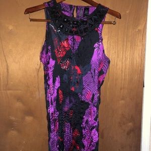 Crinkle top with embellished neckline!